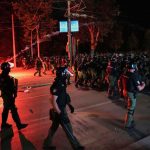 Police clash with anti-government protesters calling for early elections in Serbia